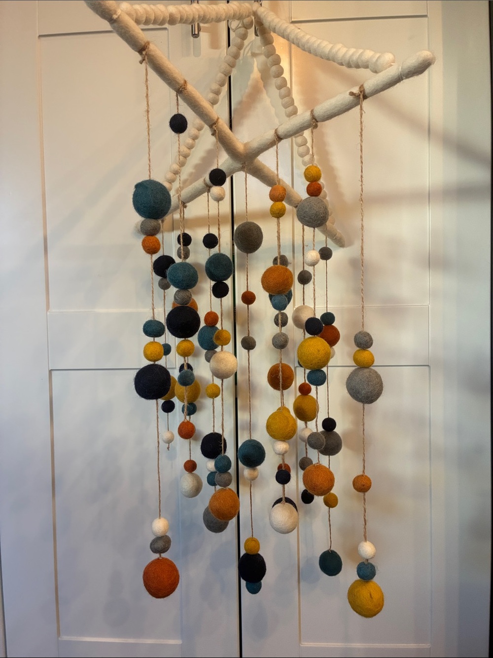 West Elm Felt Ball Mobile in Blue, Yellow, Gray, White, Brown